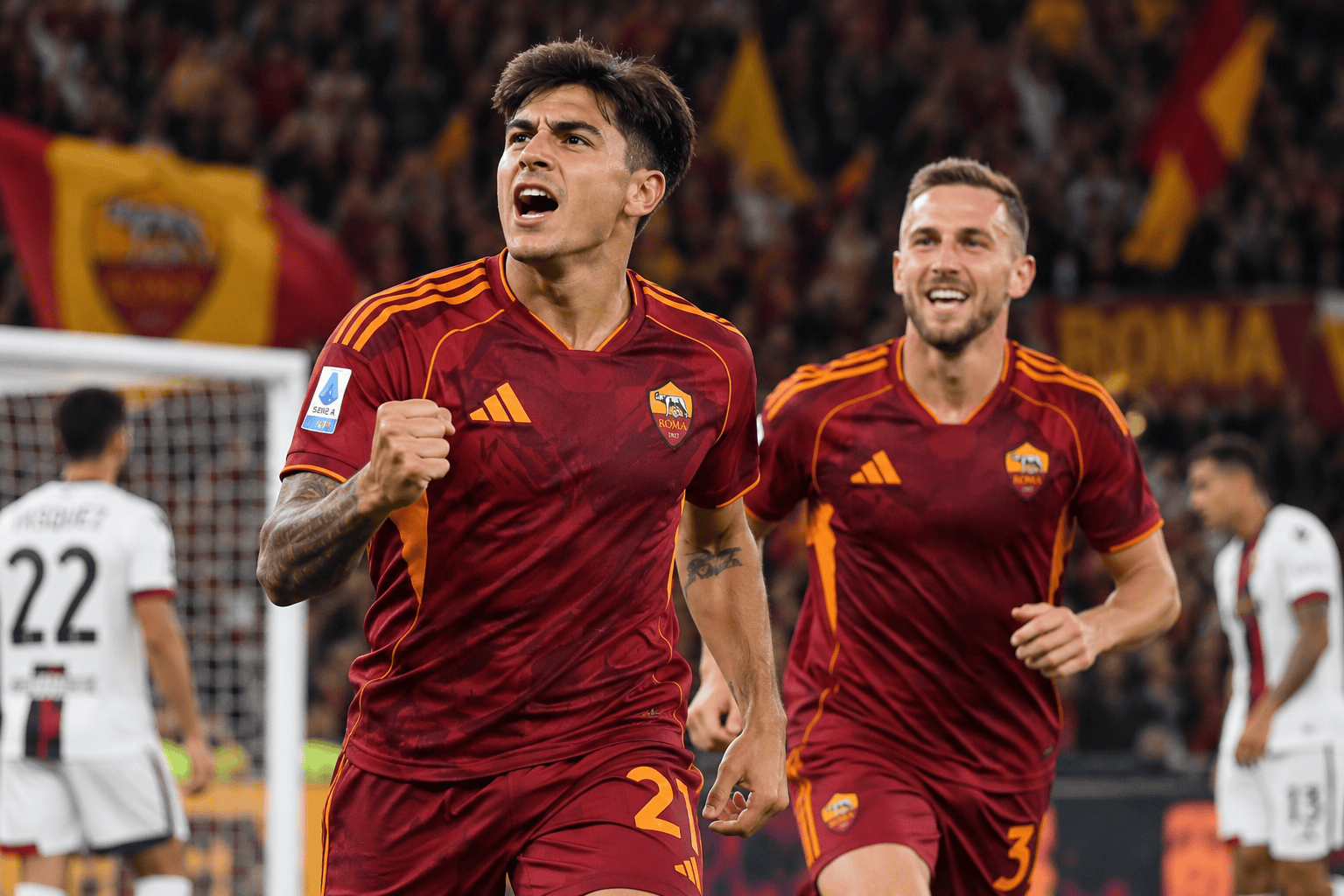 Esultanza dei giocatori giallorossi sotto le luci dello Stadio Olimpico